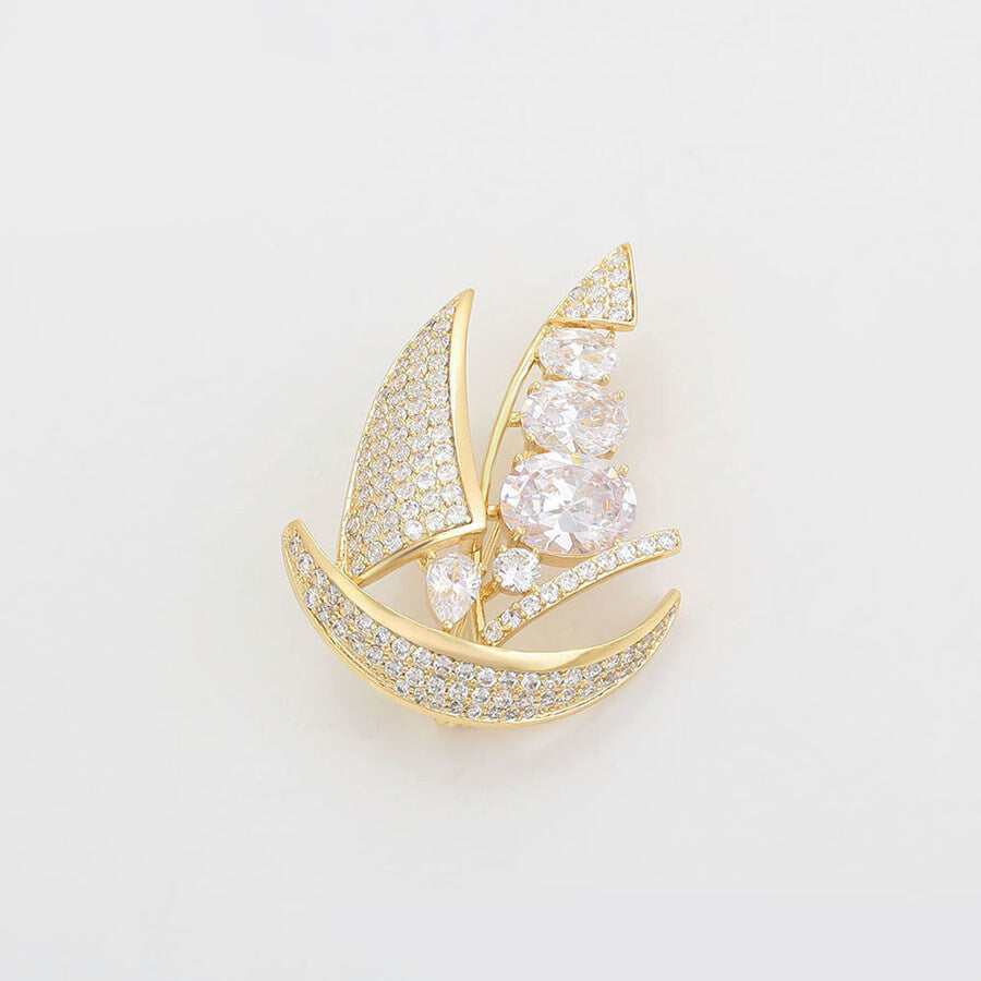 Angled View of the Gold-Plated Brooch in the shape of boat with diamonds - beautiquepoint.com