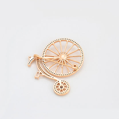 The back of the 18k Gold-plated brooch in the shape of penny-farthing with crystals - beautiquepoint.com