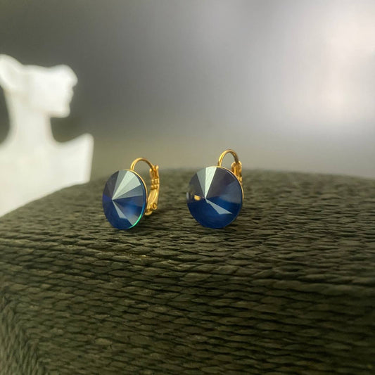 Gold plated earring with blue crystal